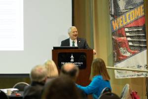 NSU President Steve Turner talks to the crowd gathered at the Northeastern State University Broken Arrow campus for the 2nd Annual Supply Chain and Logistics Conference on March 2, 2023.