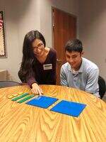 nsu math tutor working with elementary student