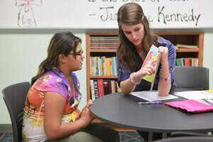 nsu tutor with elementary student